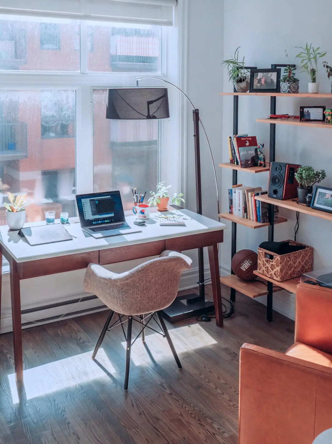 Creators desk with laptop and monitor.